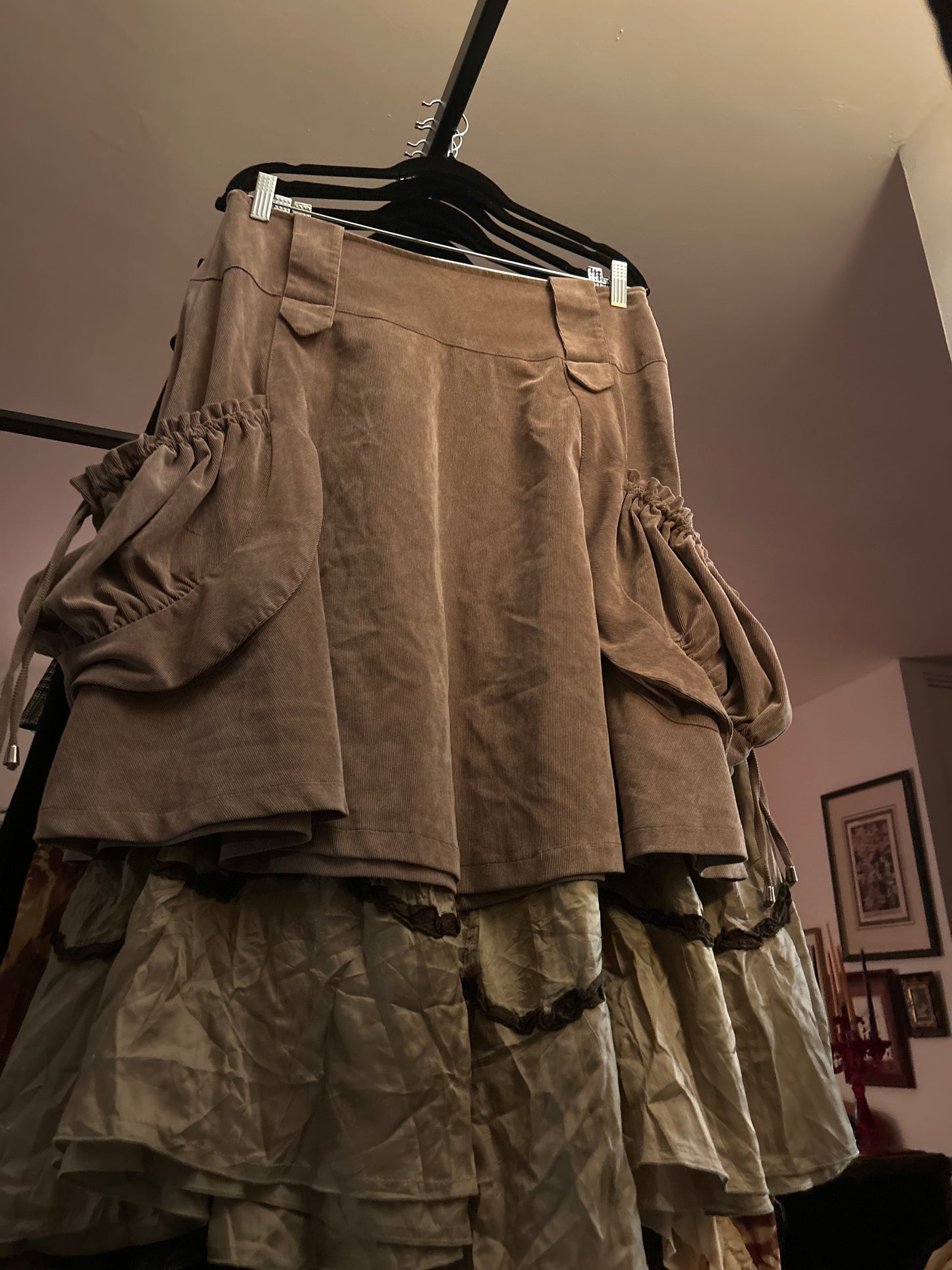 Tan skirt with exaggerated pocket 0150C6