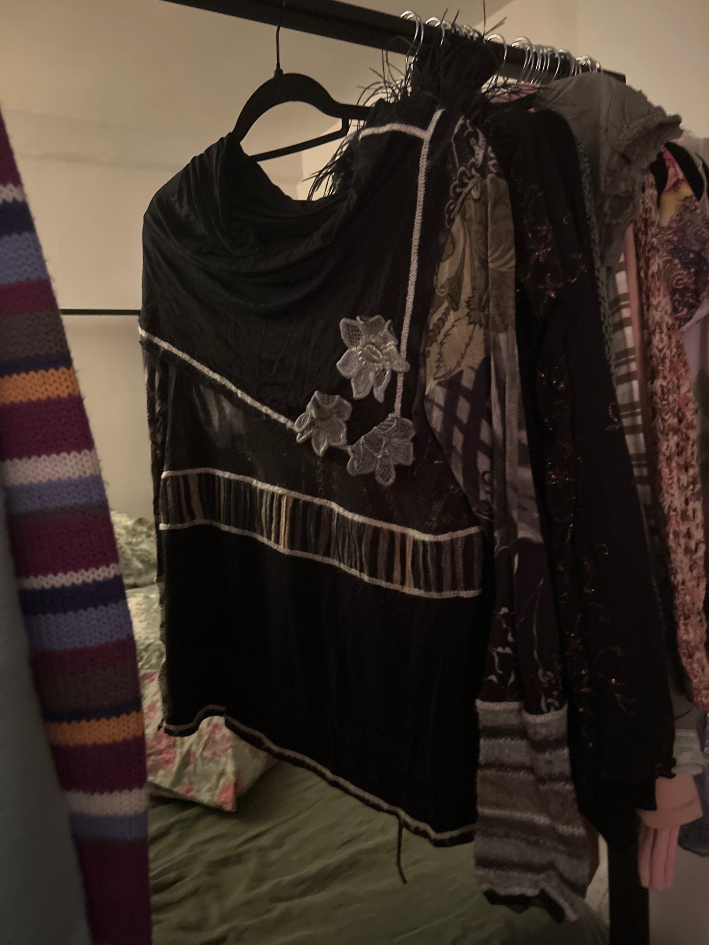Long sleeve black and grey top with rosettes