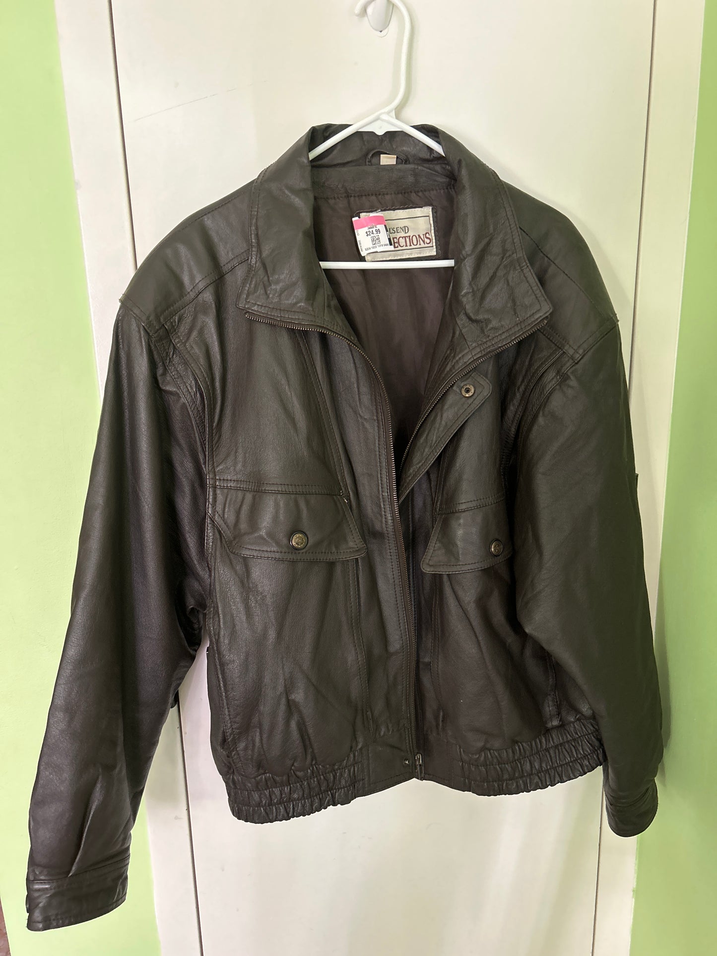 Trails and brown leather bomber
