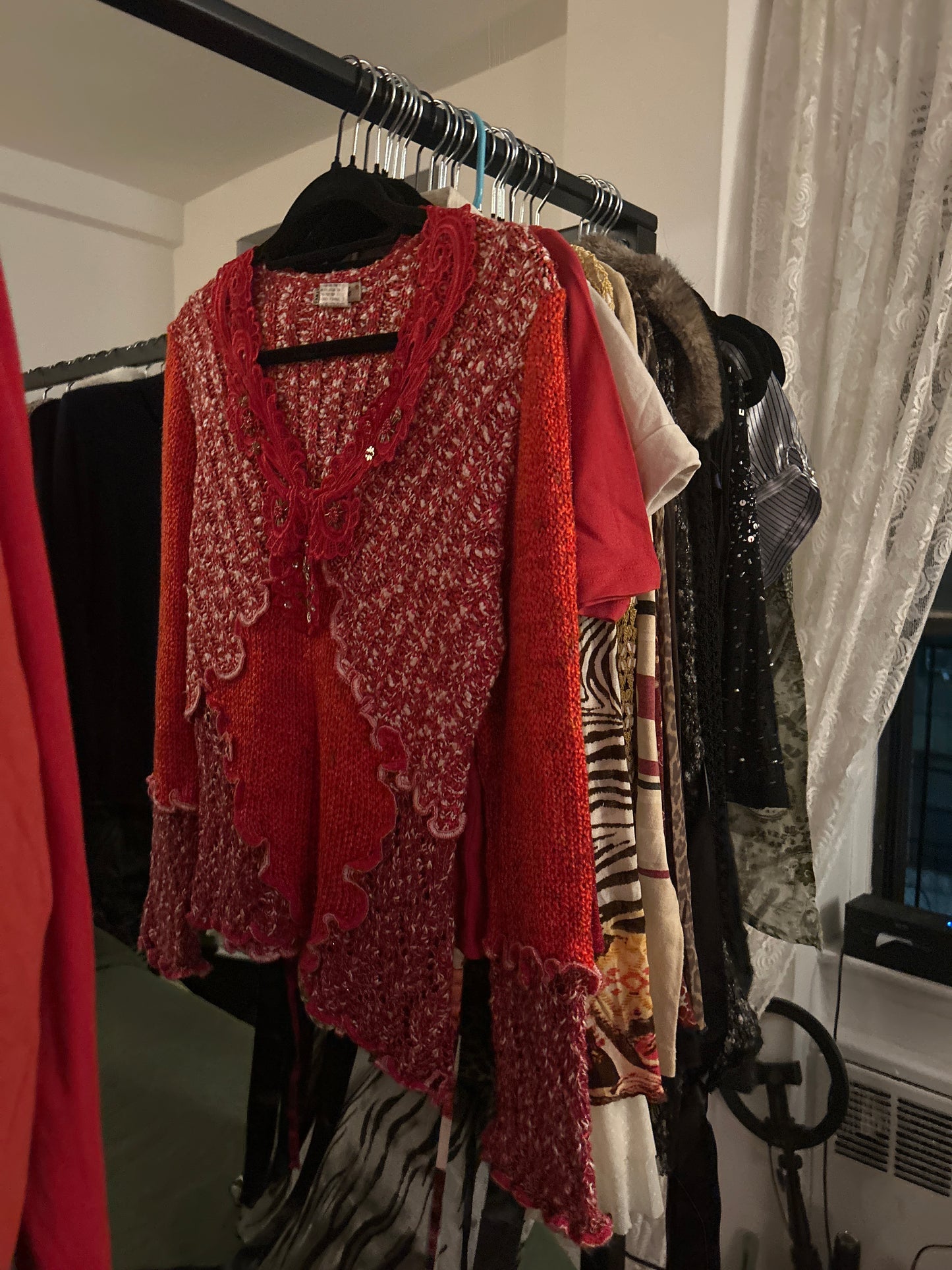 Tel Telle red sweater