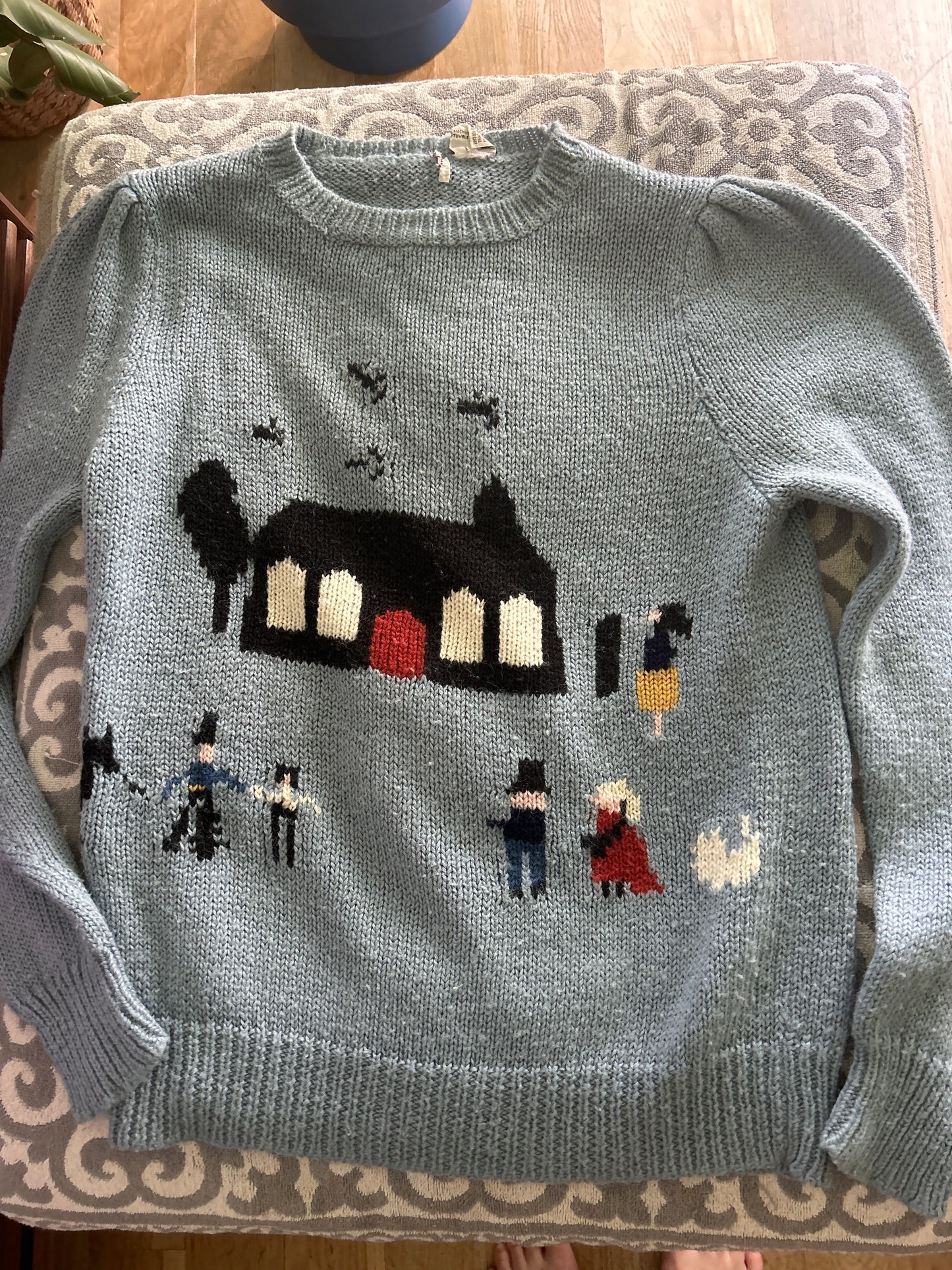 Knit sweater town scene