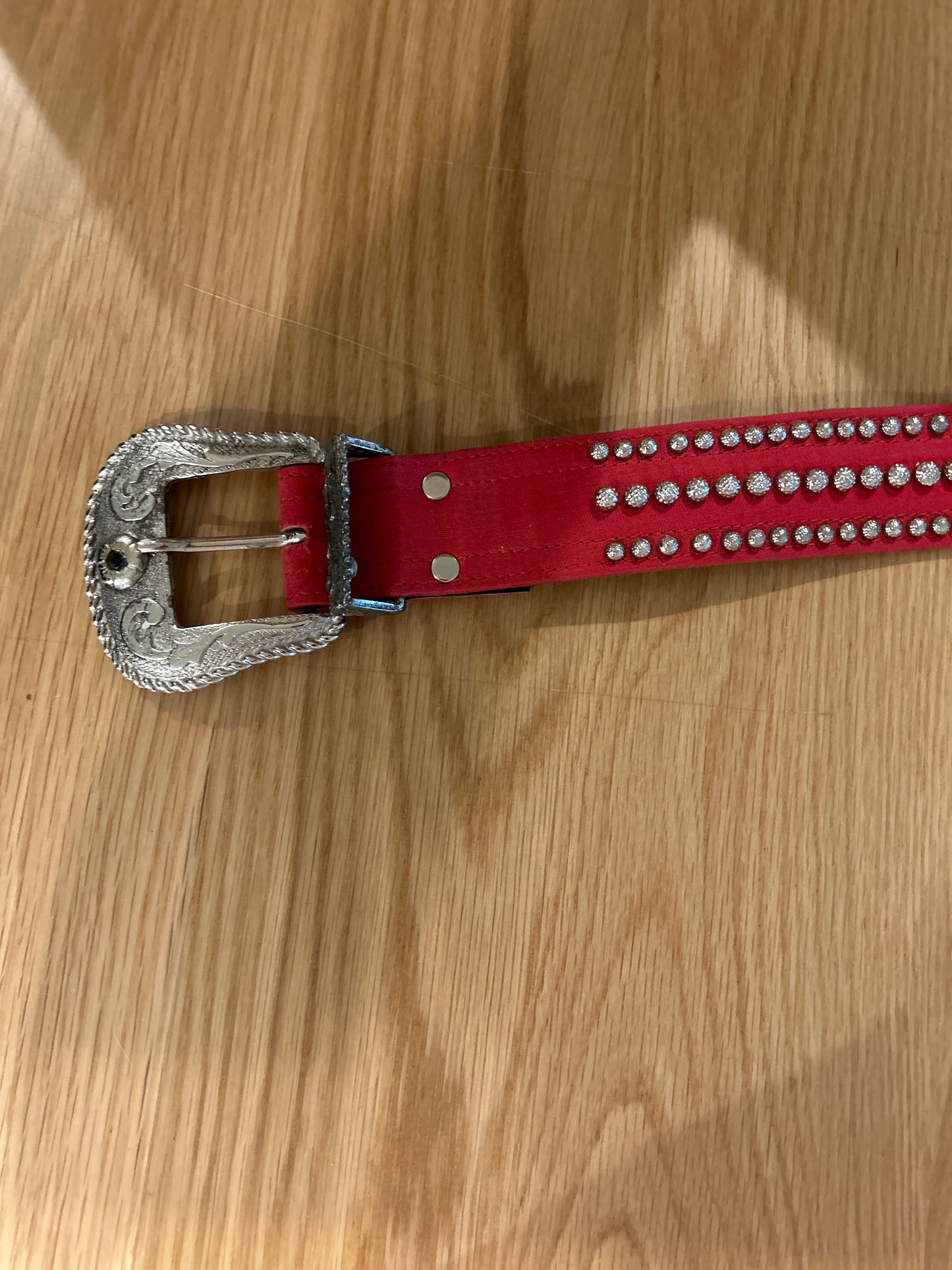 Red studded belt