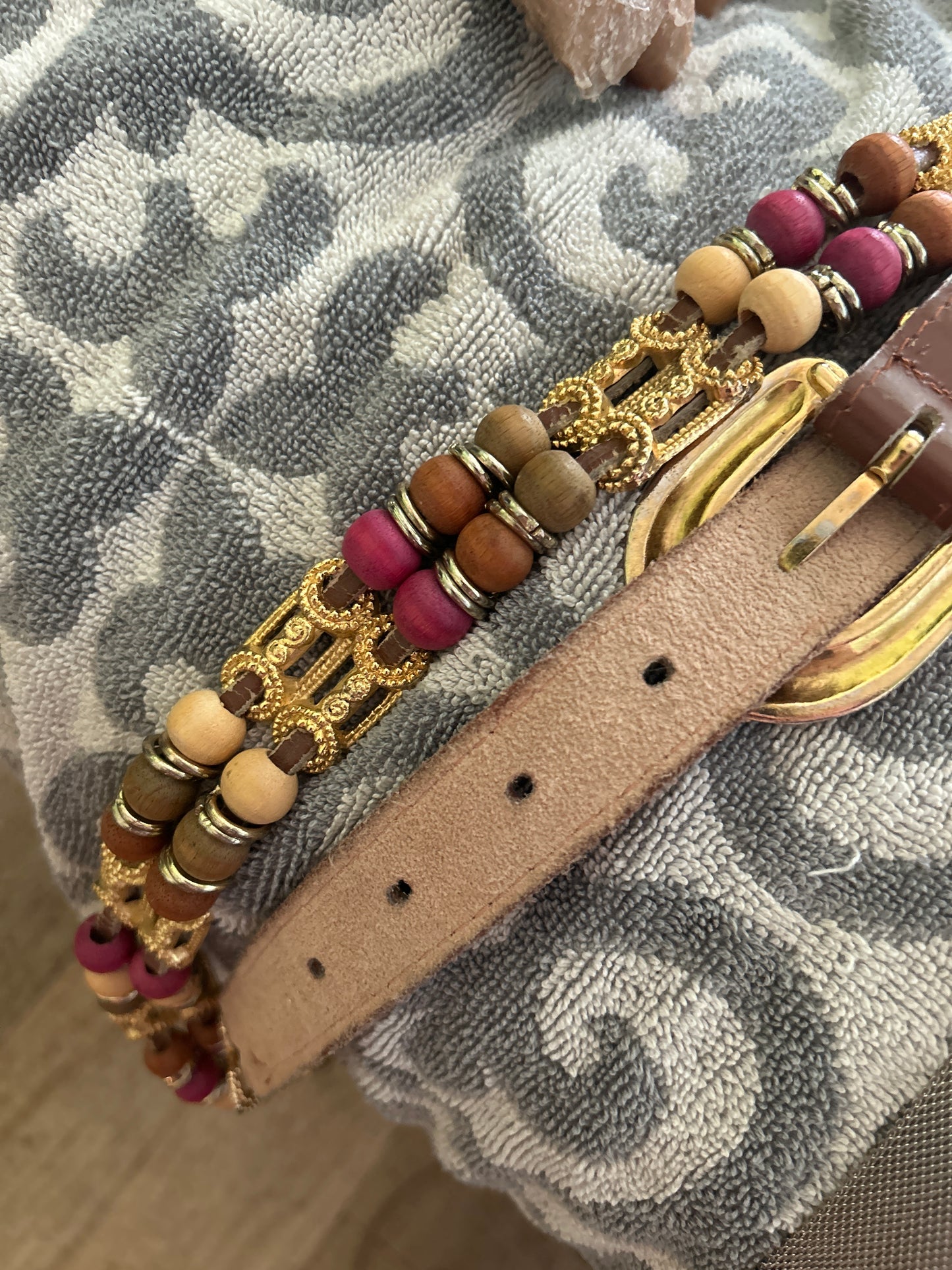 pink/tan belt with gold hardware