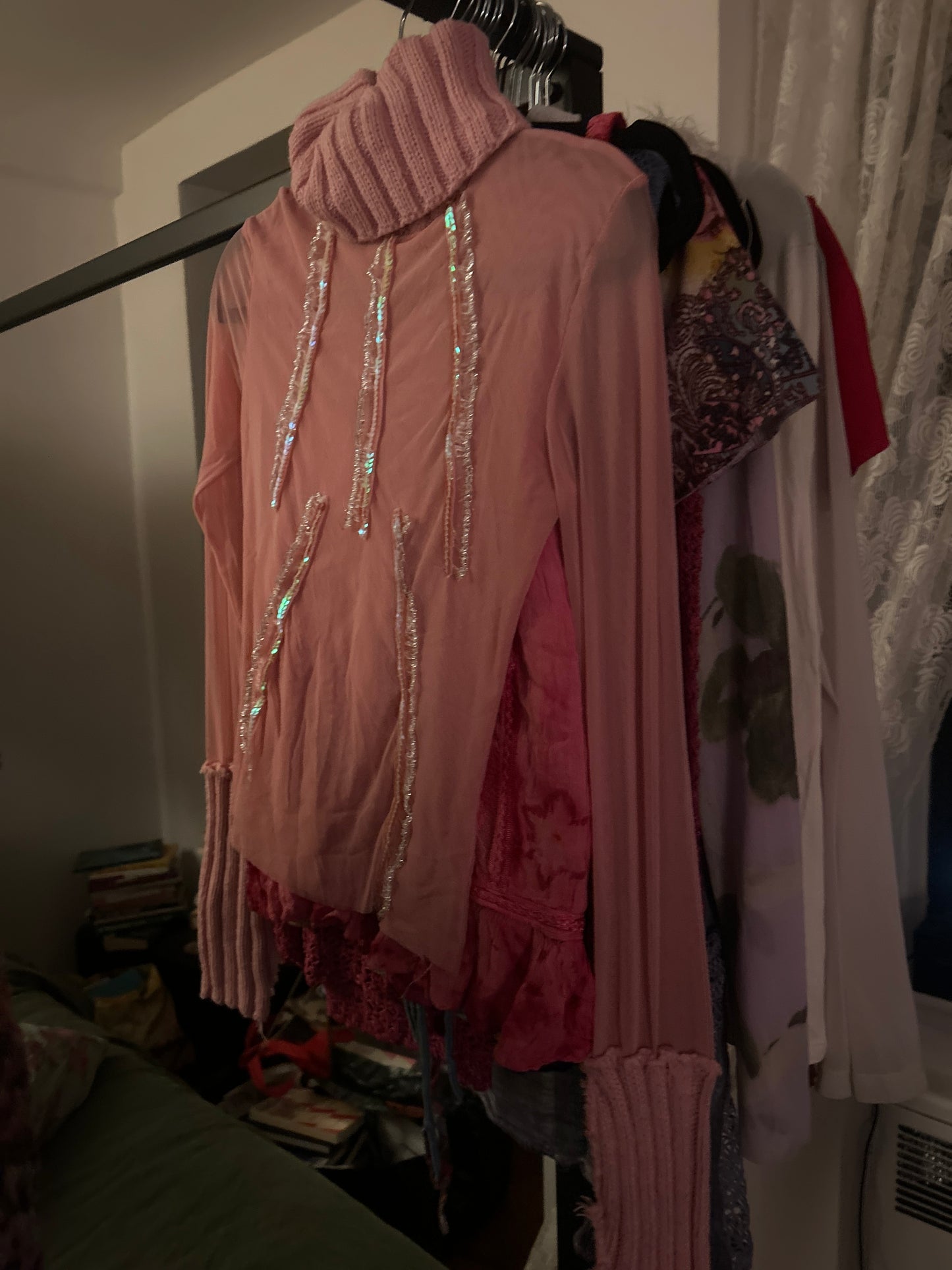Pink sheer knit turtleneck