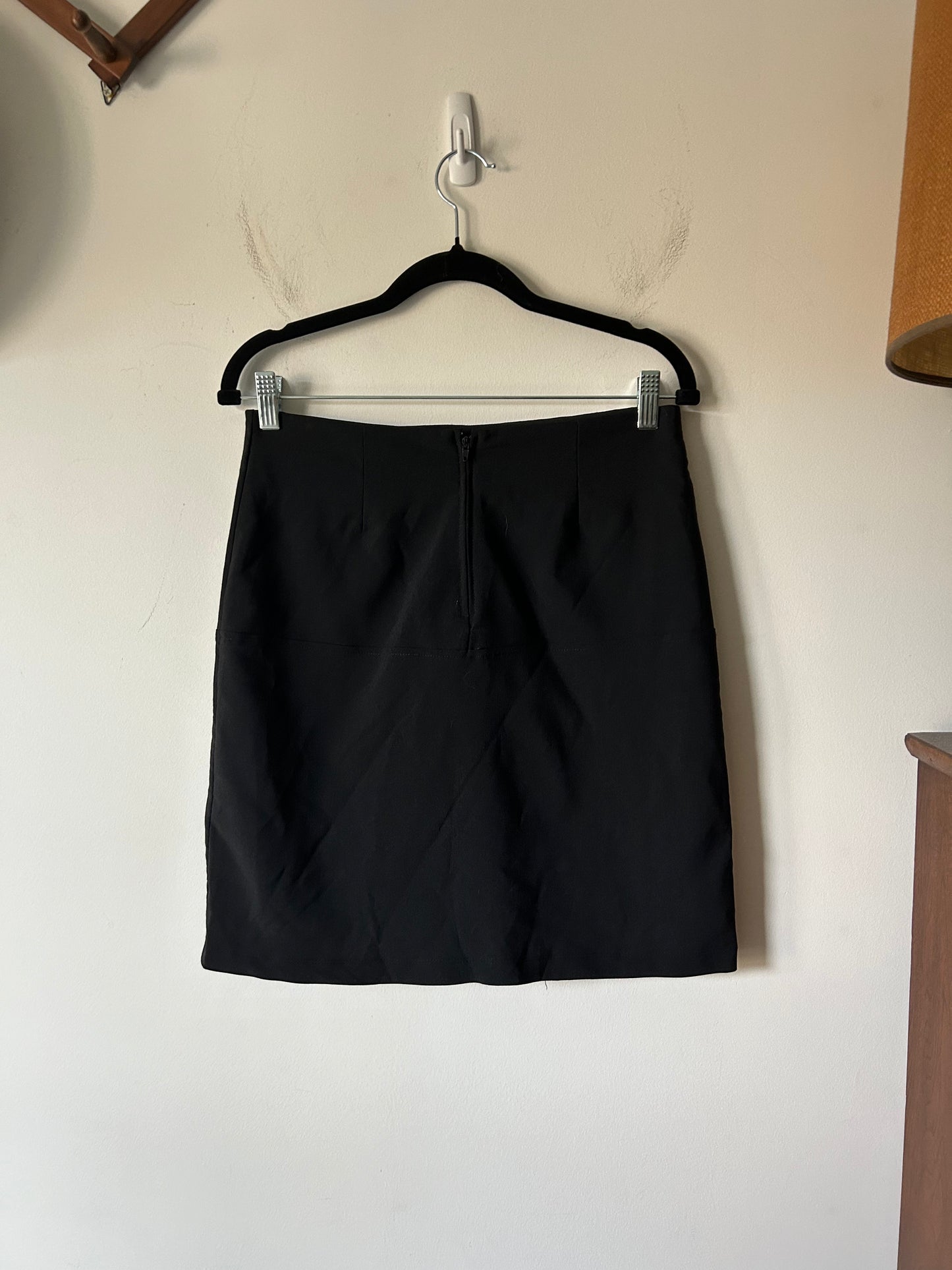 black mini skirt with off center slit