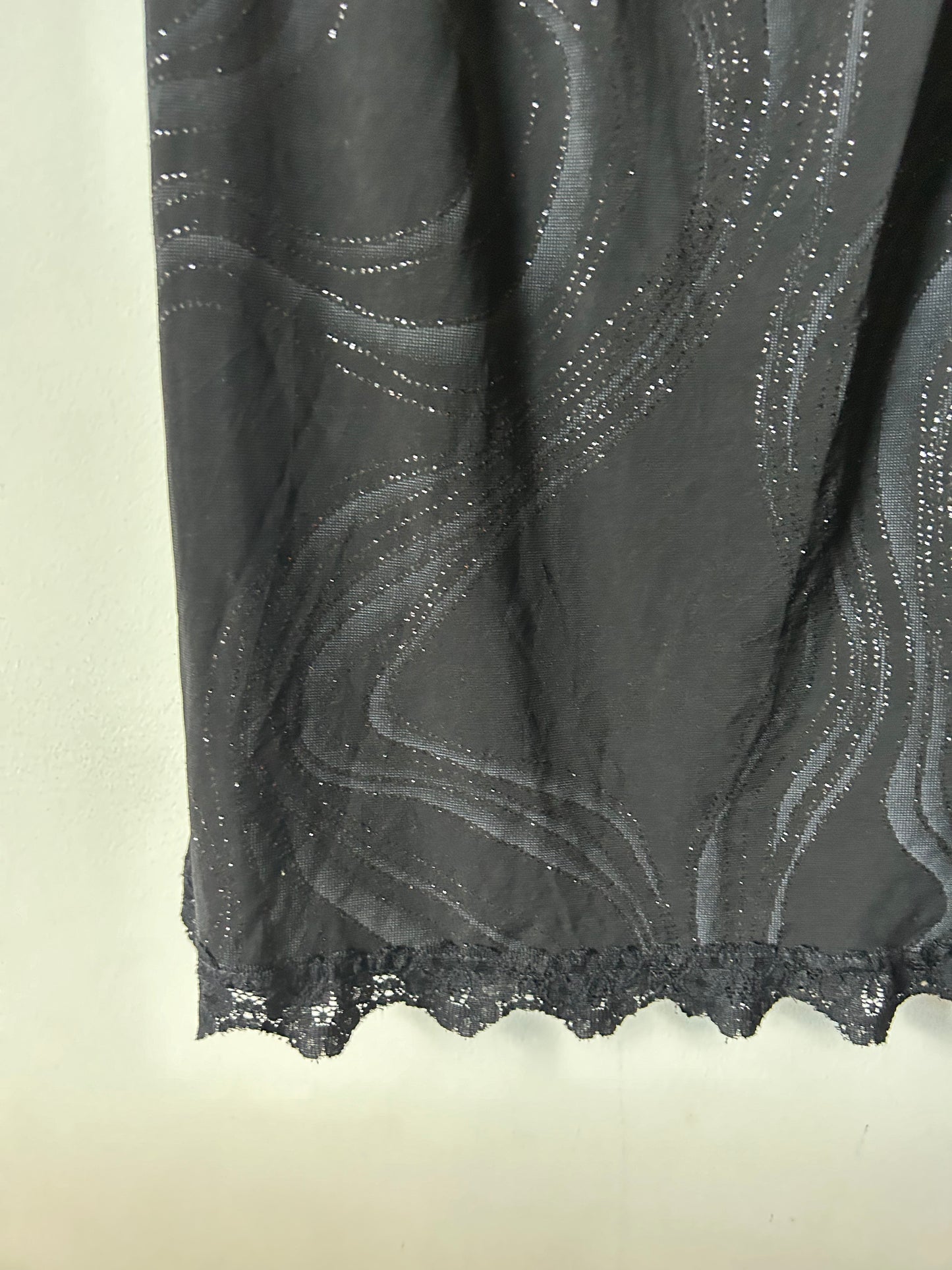 black halter dress with lace and glitter details