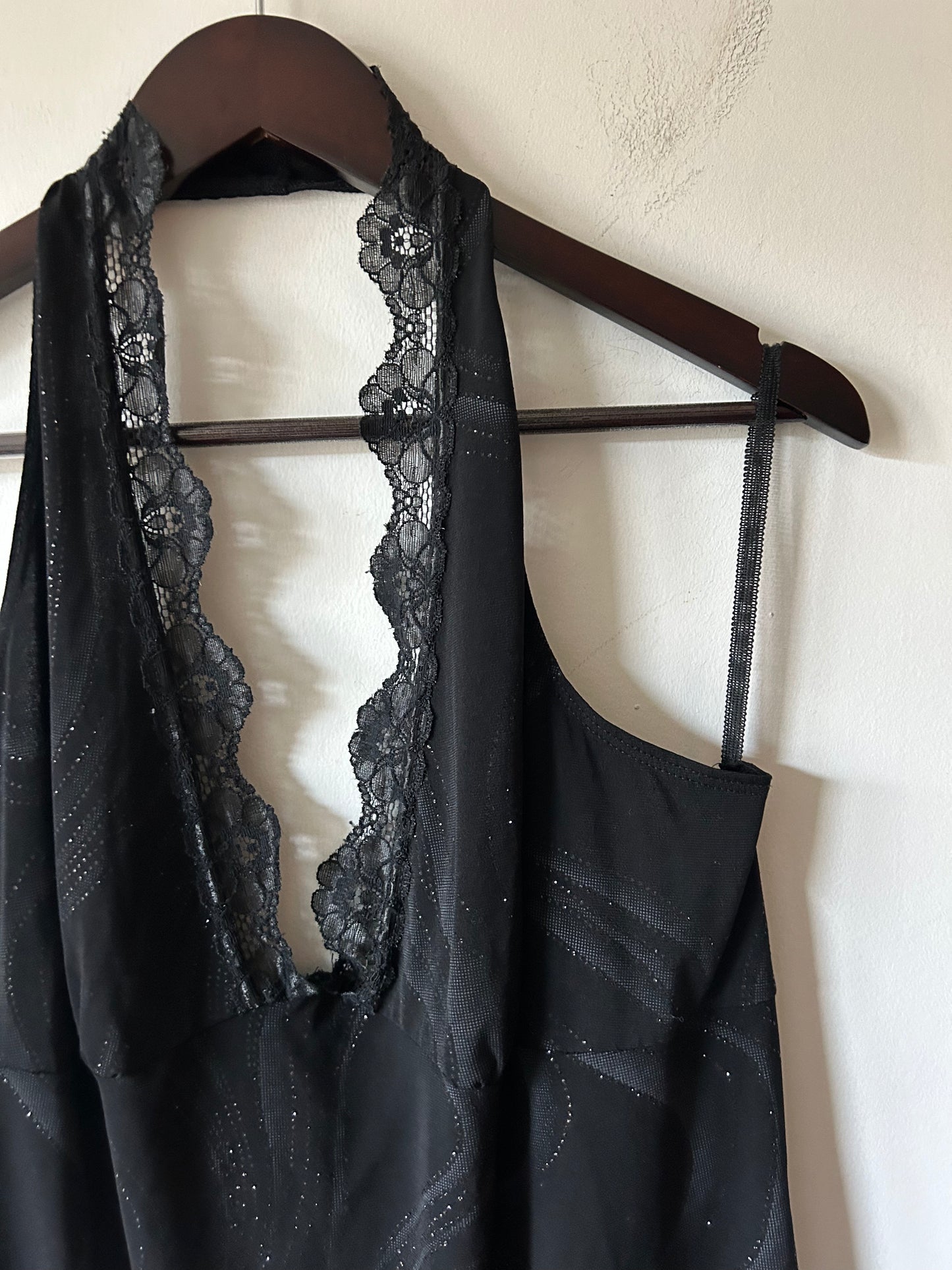 black halter dress with lace and glitter details