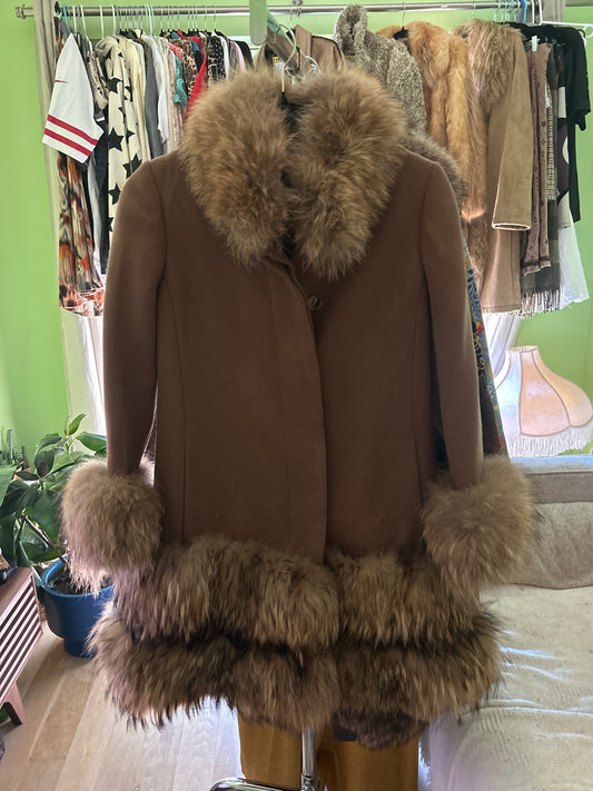 Brown coat with raccoon fur trim