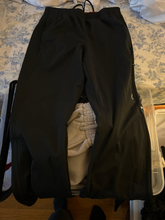 Black adidas black stripe track pants
