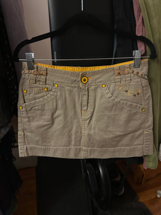Mini skirt with orange embroidery details