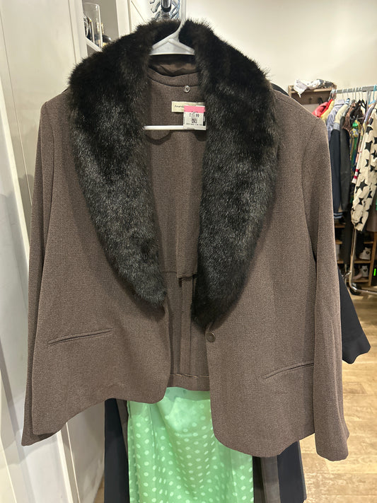 Brown jacket with black fur collar