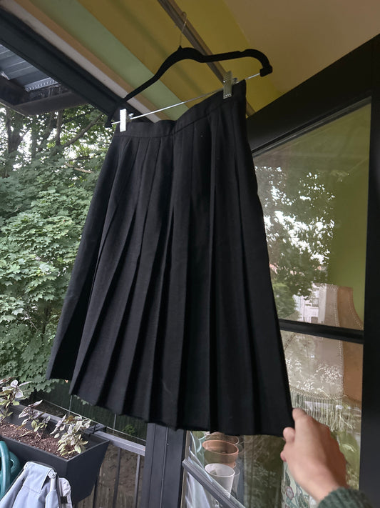 black pleated skirt