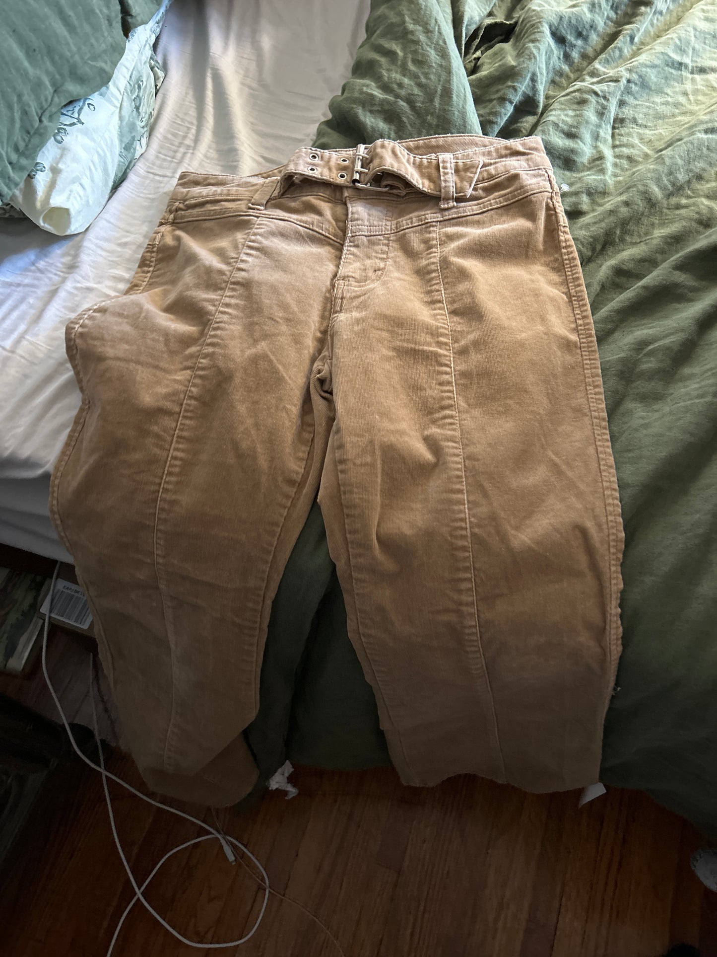The blues corduroy pants with belt