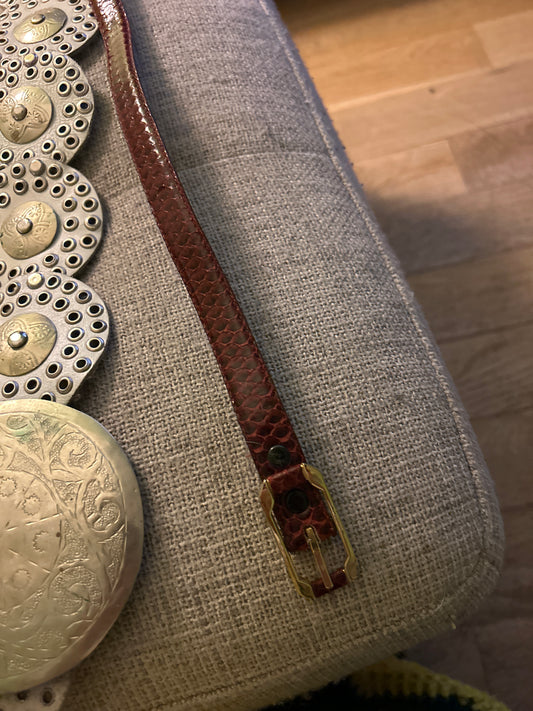Burgundy snakeskin belt