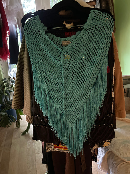 Blue crochet poncho