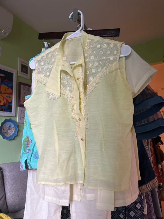 Yellow sheer sleeveless top
