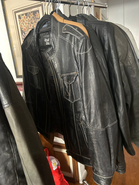 White stitched black leather jacket