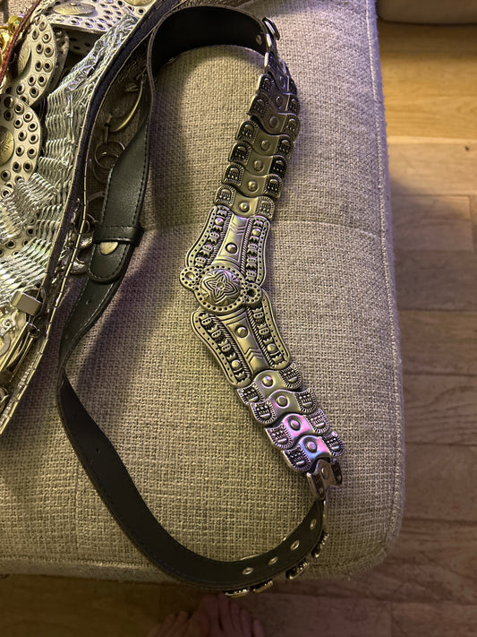 Black belt with large silver hardware