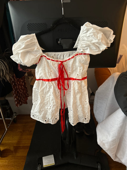 White eyelet top with red bow