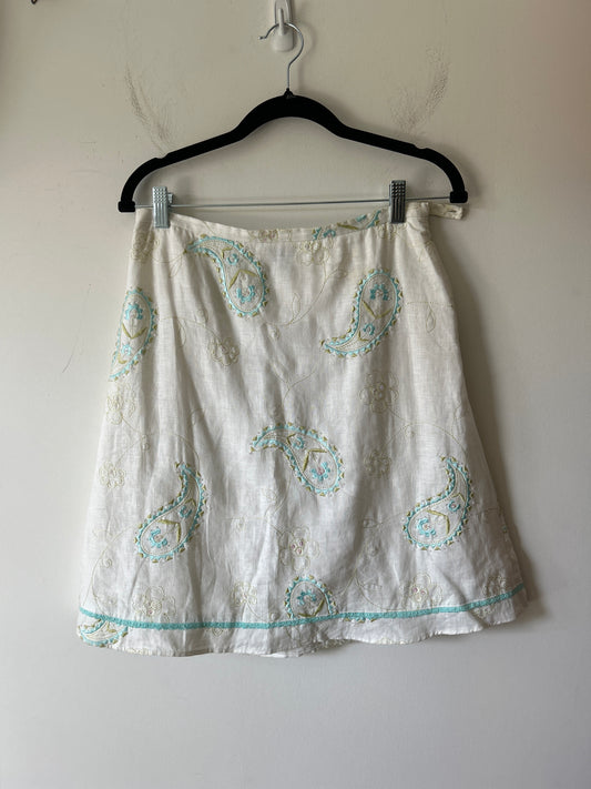white linen midi skirt with embroidered paisley and eyelet details
