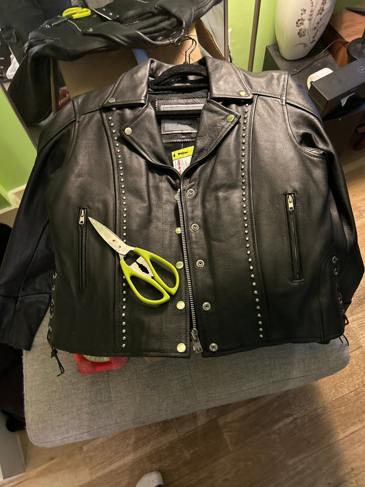 Leather jacket with studded hardware