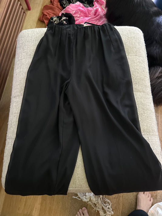 Black pants with sheer overlay