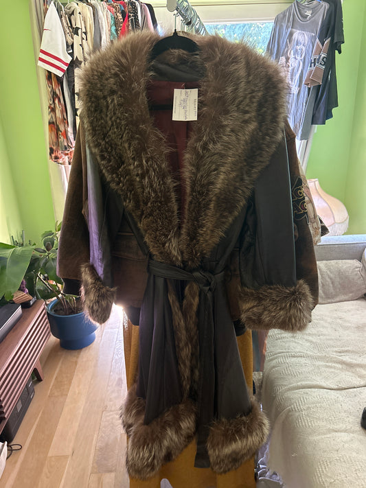 Leather princess coat with raccoon trim