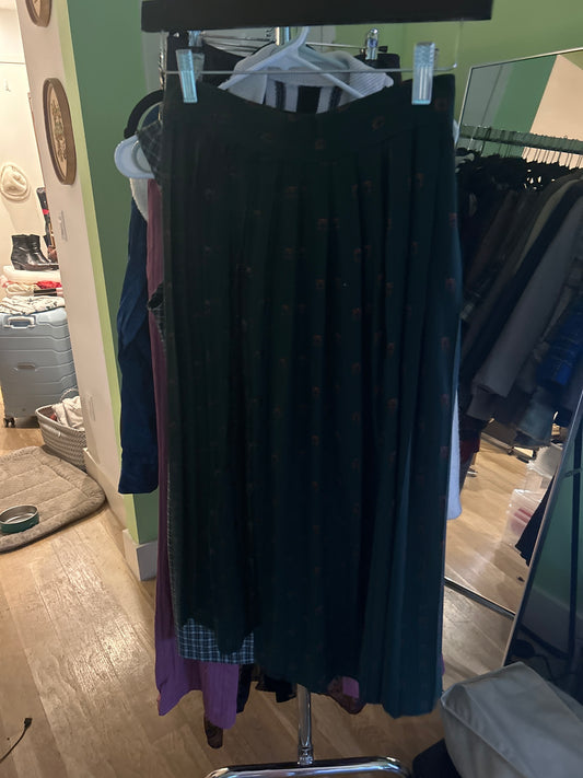 Dark green pleated skirt
