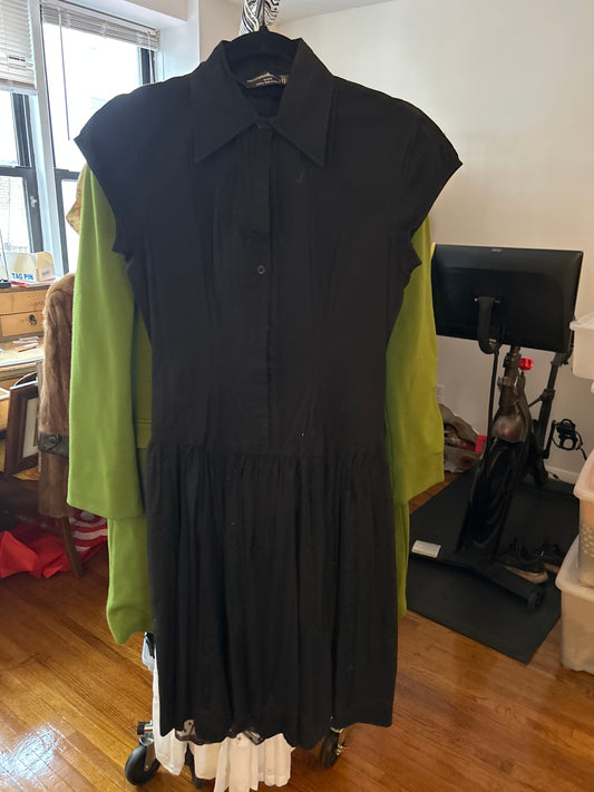 JM at 266 Norma Kamali black cotton dress