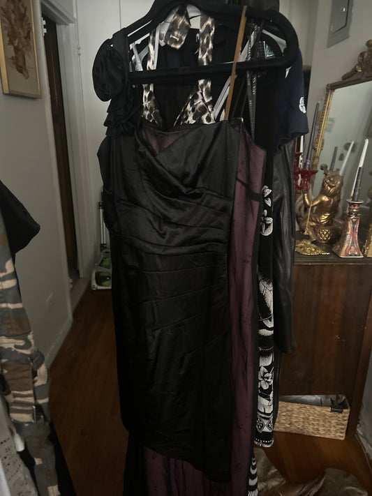 Black mini dress with rosettes