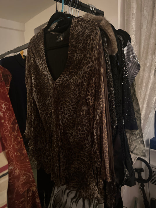 Free woman sheer animal print top