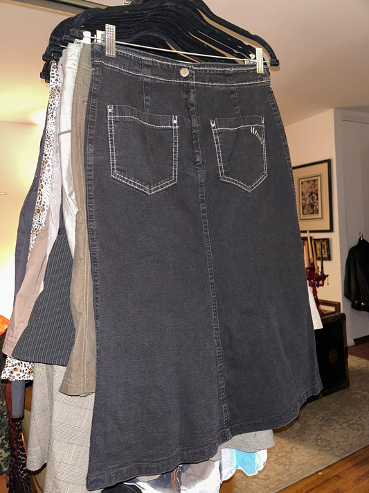Black denim skirt with white stitching