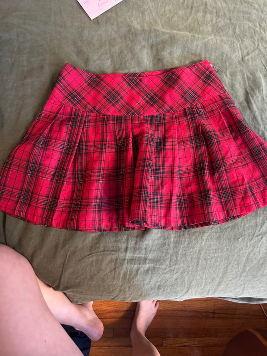 Red plaid pleated mini skirt