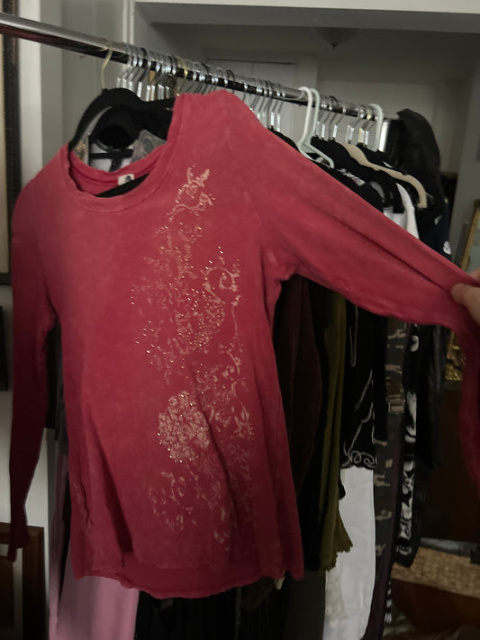 Coral long sleeve graphic top