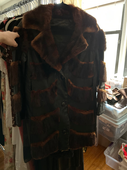 Black leather and dark orange fur jacket