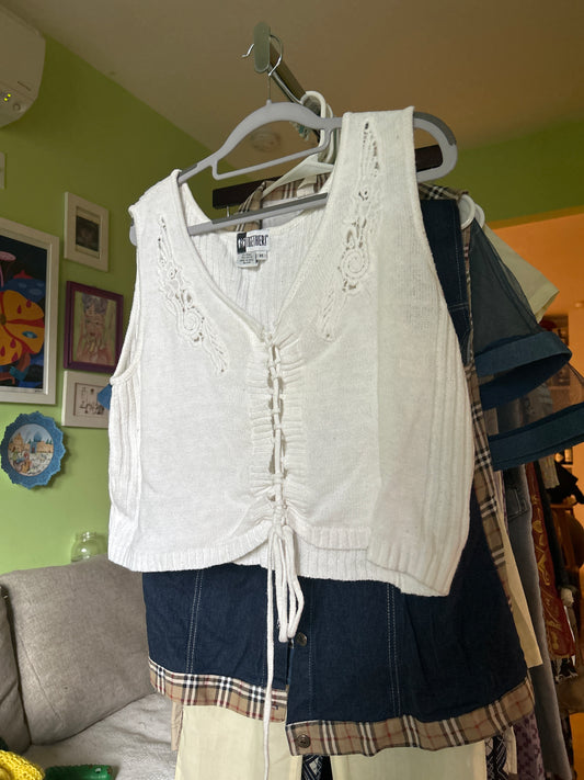 White sleeveless sweater