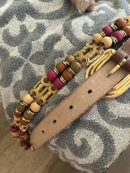 pink/tan belt with gold hardware