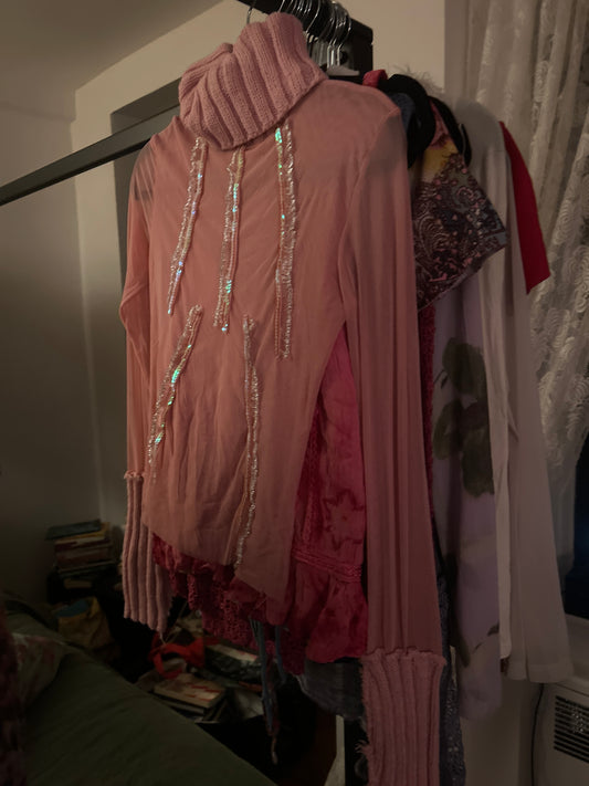 Pink sheer knit turtleneck
