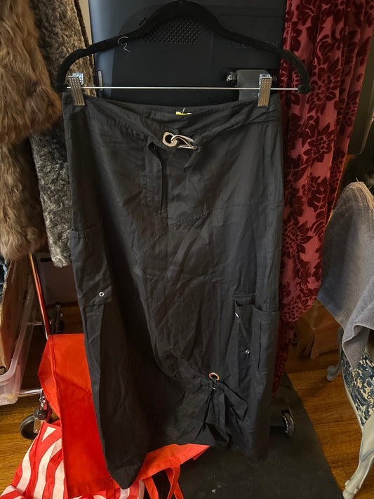 Italian black skirt with grommets 015042