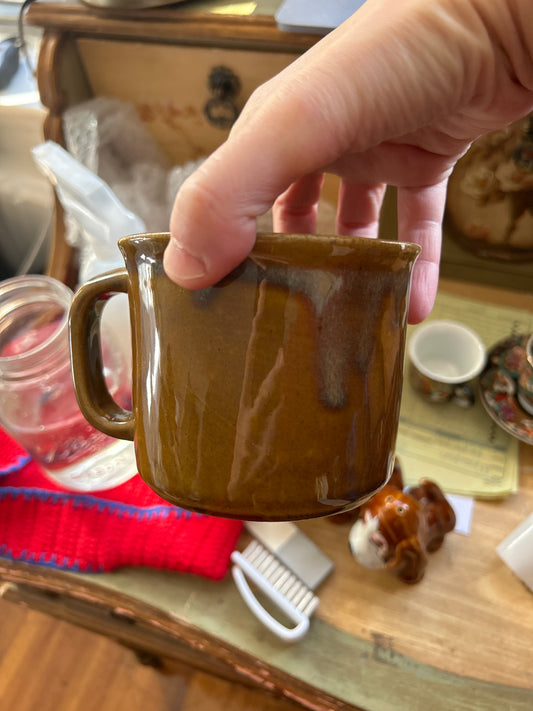Brown mug glaze drips