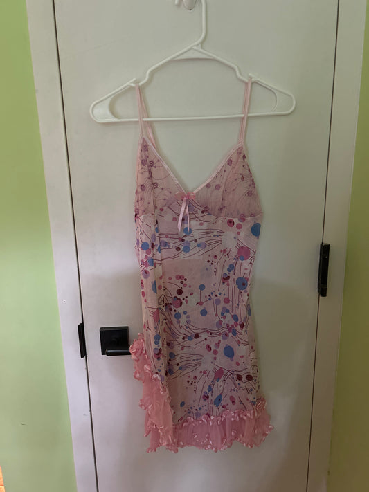 light pink slip with blue/purple spots