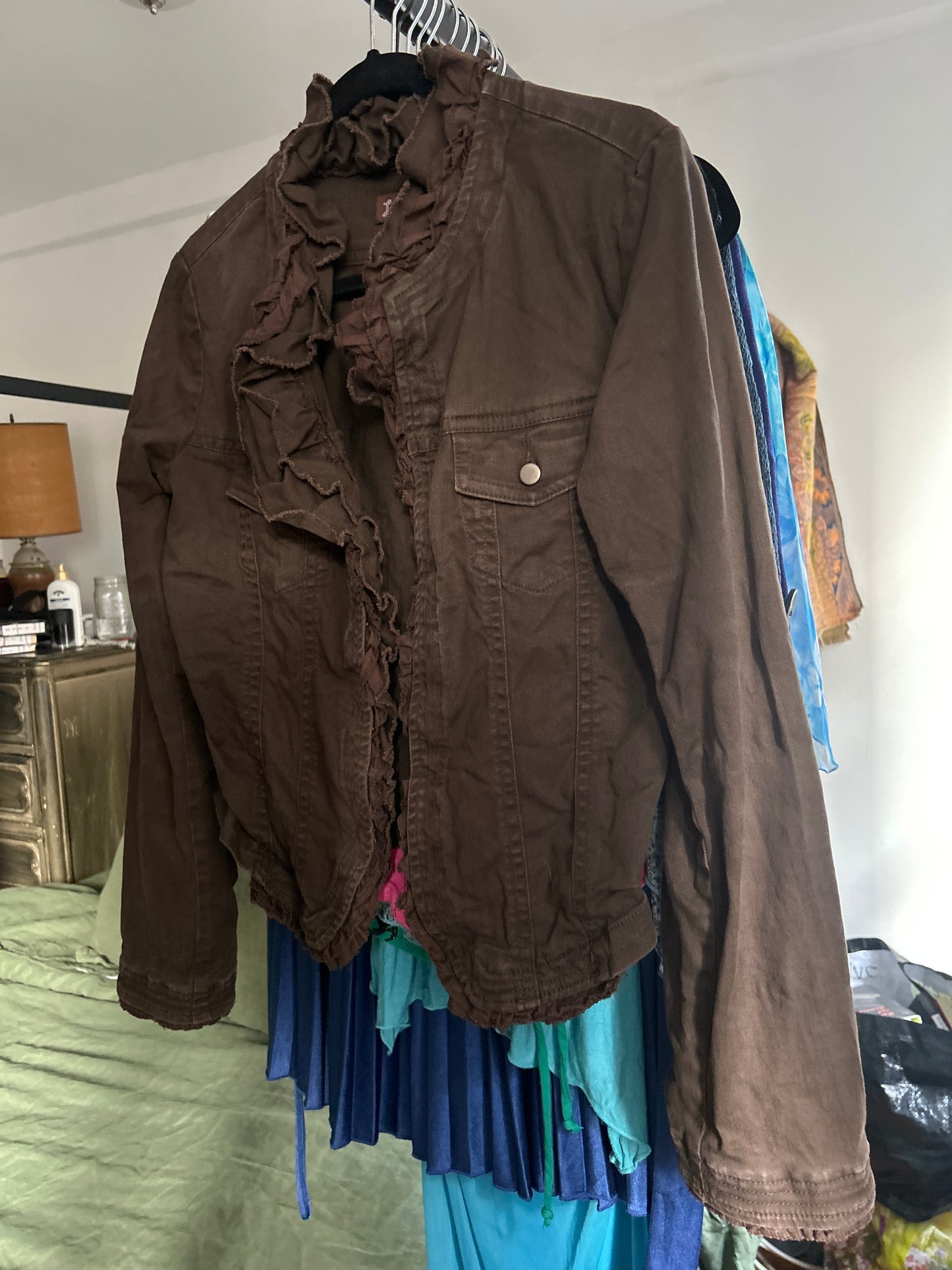 Brown denim jacket with ruffle