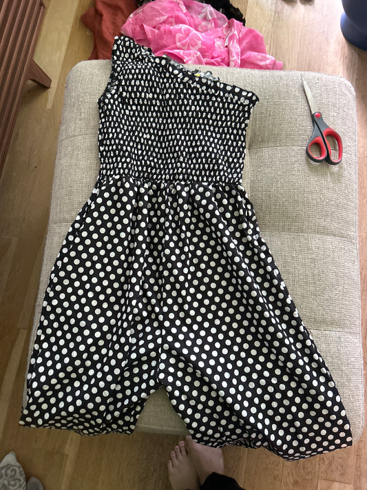 Black-and-white polkadot jump suit