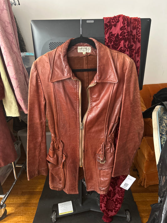 Brown leather jacket with buckle