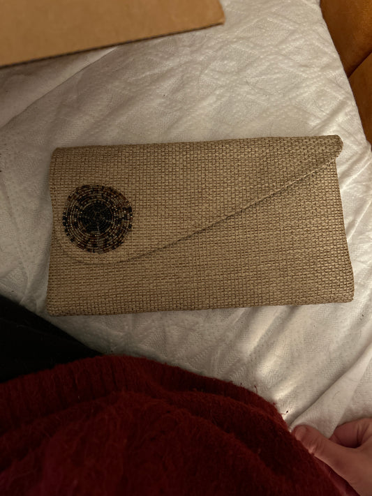 Tan handbag with beading