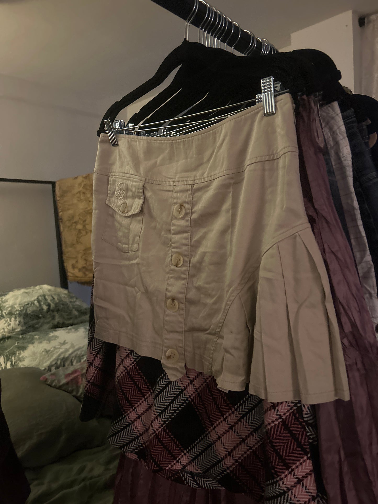 Tan mini skirt with pocket and pleats