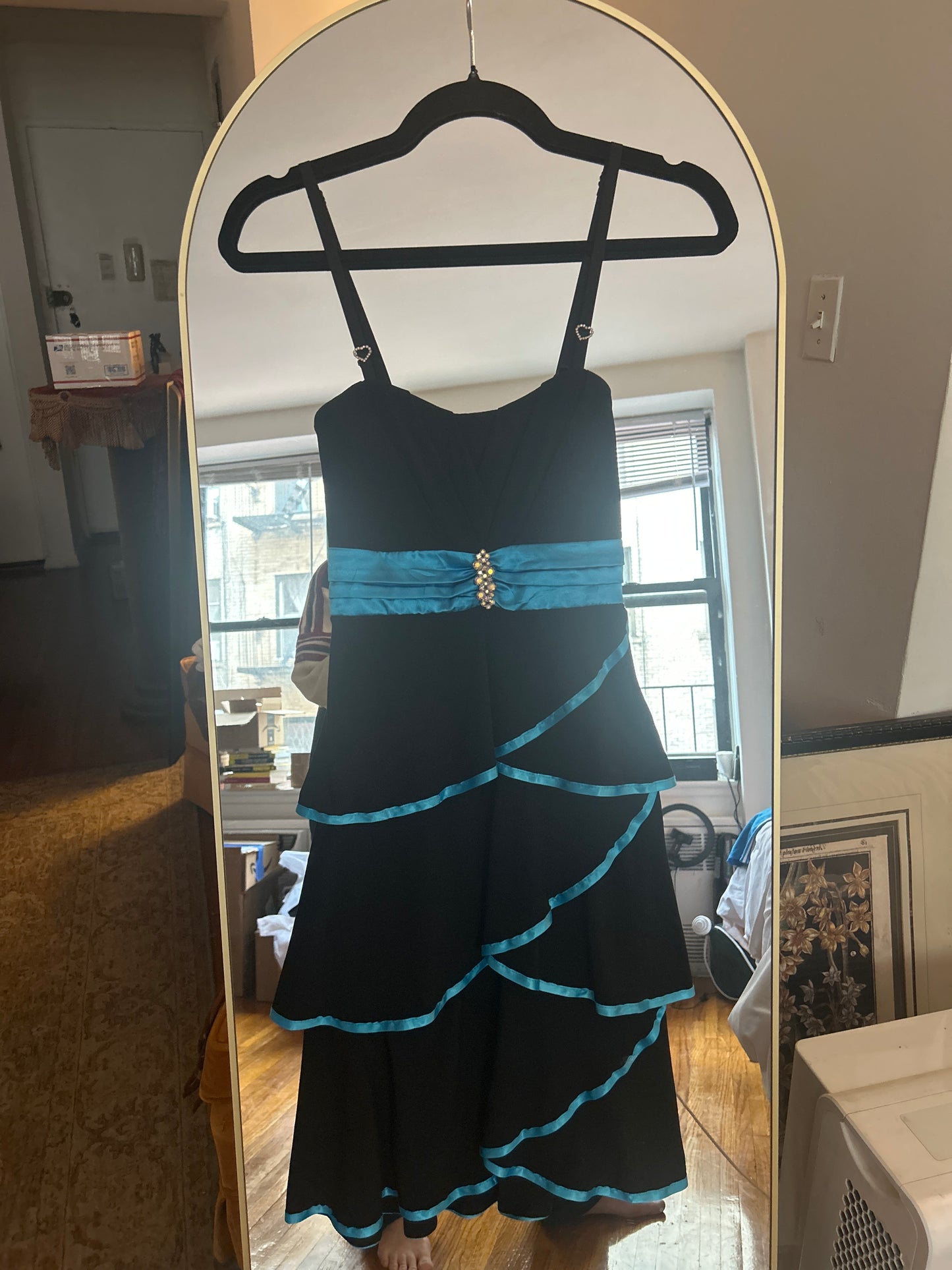 Black dress with blue ribbon