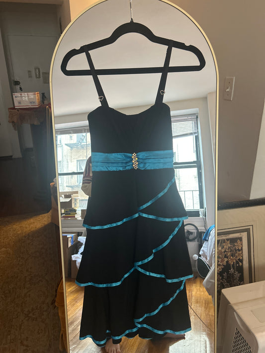 Black dress with blue ribbon