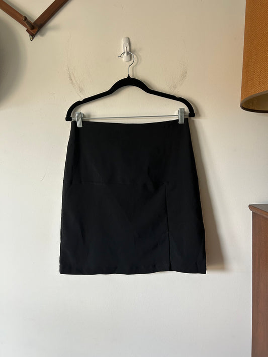 black mini skirt with off center slit