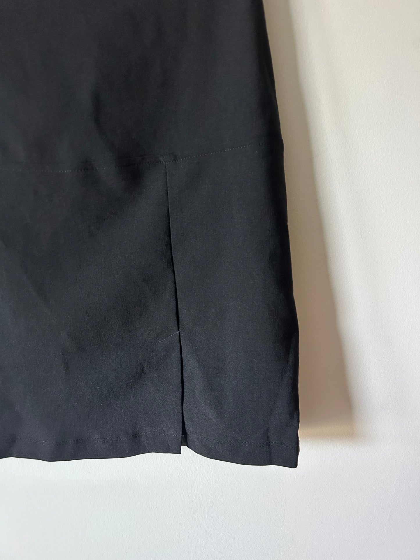black mini skirt with off center slit